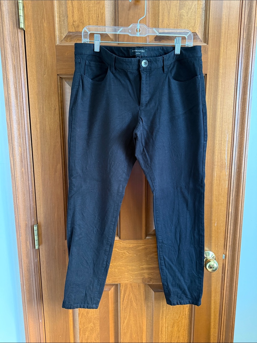 Banana Republic Sloan Fit black pants, women’s size 12.